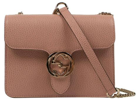 gucci crossbody interlocking g pink|Gucci pink mini flower pouch.